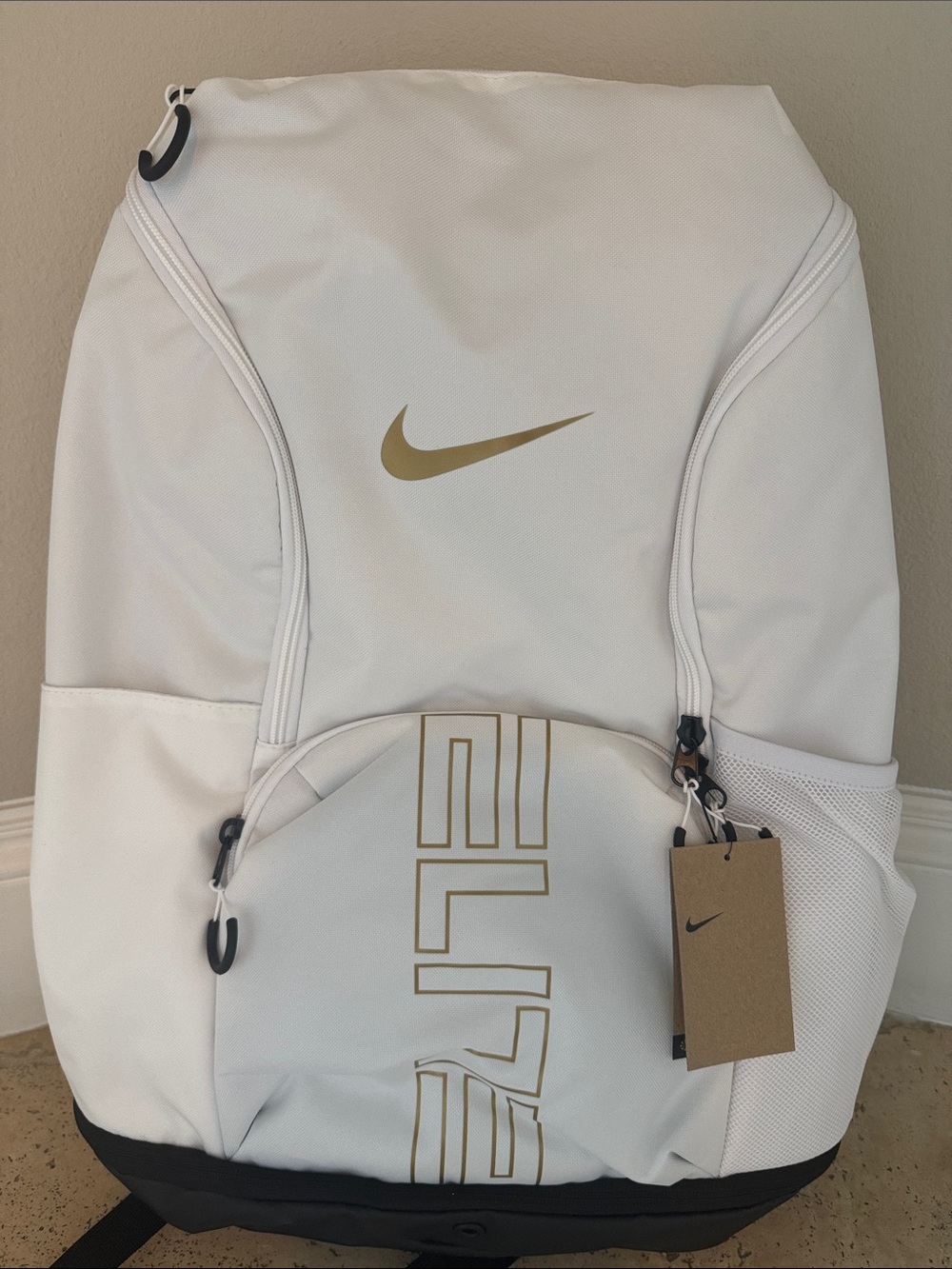 Nike Men’s White and Gold Logo Backpack